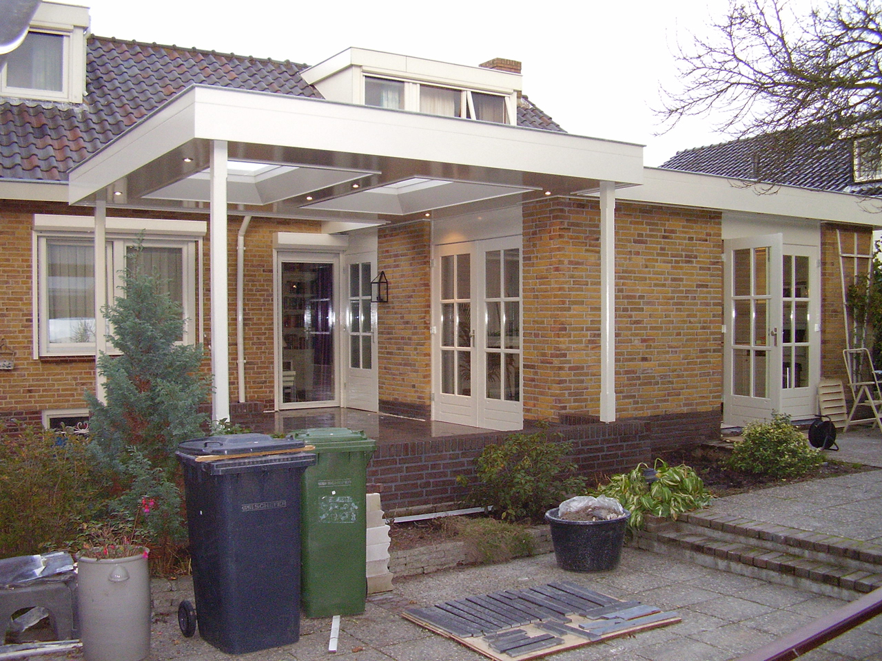 Keuken aanbouw met overkapping in rijsen